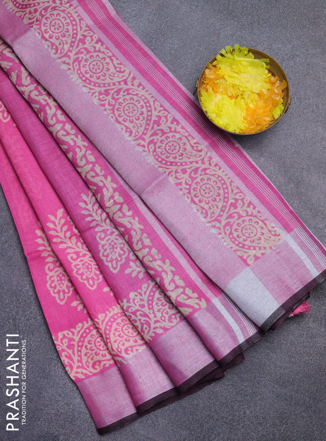 Pure linen saree pink and black with butta prints and silver zari woven border