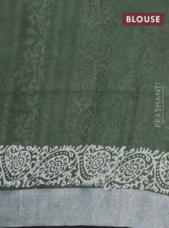 Pure linen saree sap green and black with butta prints and silver zari woven border