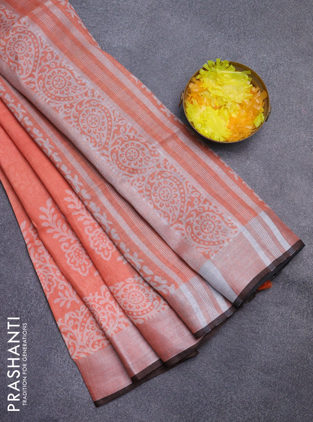 Pure linen saree peach orange and black with butta prints and silver zari woven border