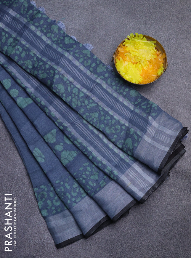Pure linen saree grey and pastel green with batik butta prints and silver zari woven border