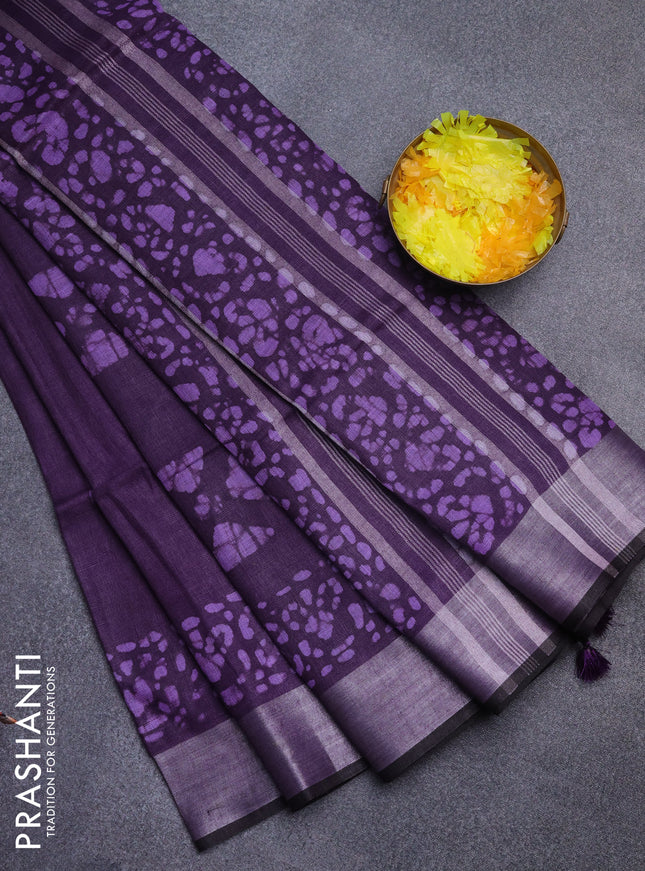 Pure linen saree deep violet with batik butta prints and silver zari woven border