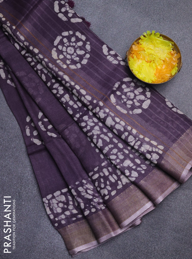 Pure linen saree wine shade with batik butta prints and zari woven border
