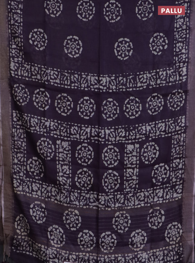 Pure linen saree wine shade with batik butta prints and zari woven border