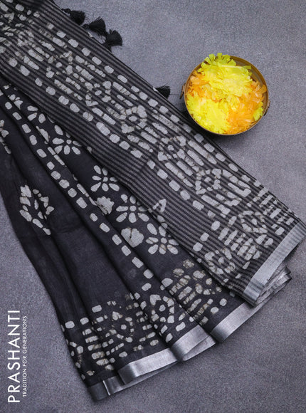 Pure linen saree black with allover batik prints and silver zari woven border