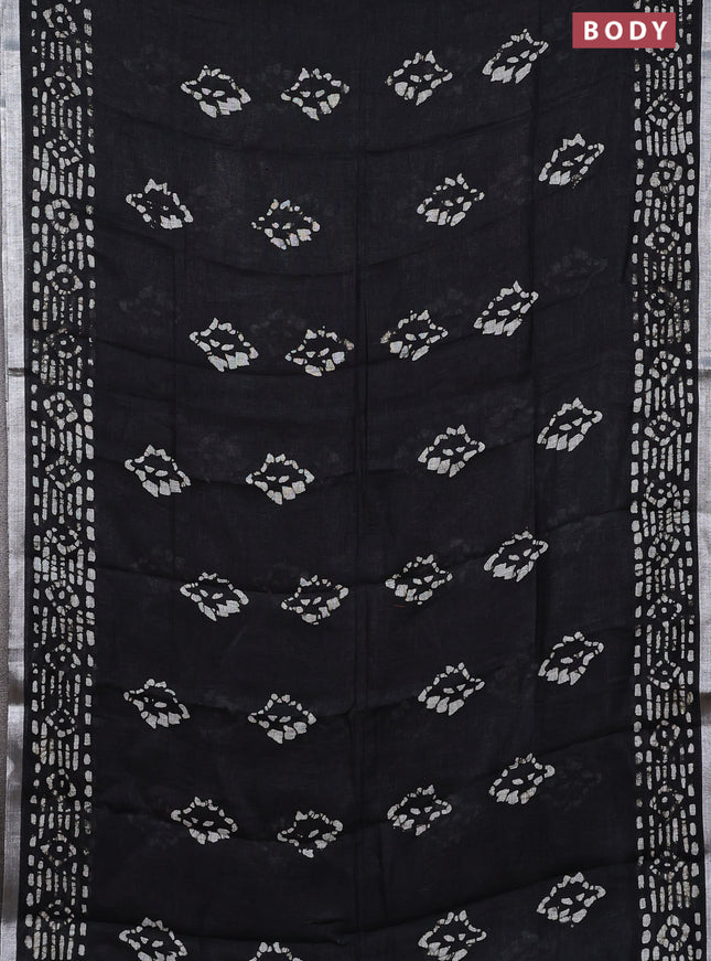 Pure linen saree black with allover batik prints and silver zari woven border