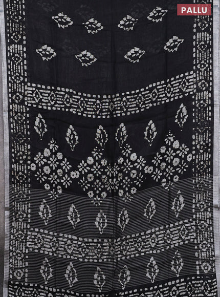 Pure linen saree black with allover batik prints and silver zari woven border