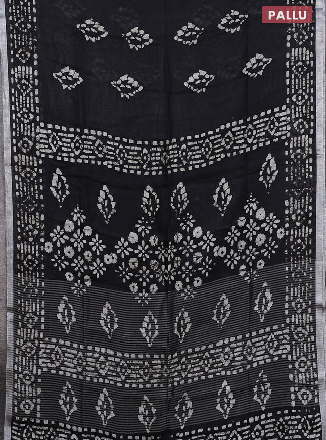 Pure linen saree black with allover batik prints and silver zari woven border