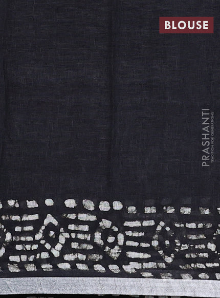 Pure linen saree black with allover batik prints and silver zari woven border