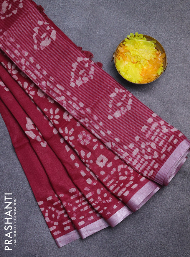 Pure linen saree maroon with allover batik prints and silver zari woven border