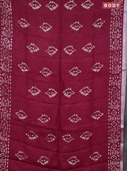 Pure linen saree maroon with allover batik prints and silver zari woven border