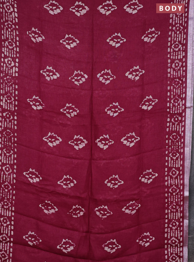 Pure linen saree maroon with allover batik prints and silver zari woven border