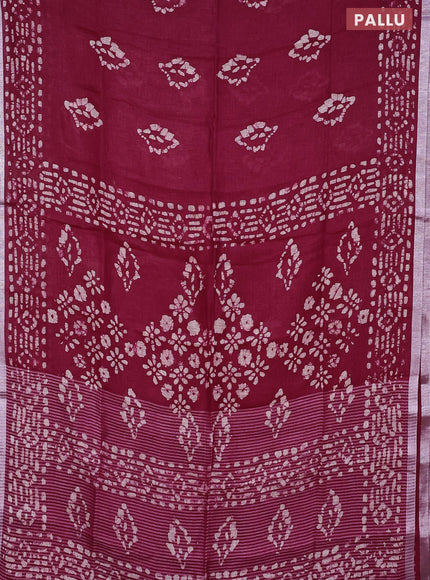 Pure linen saree maroon with allover batik prints and silver zari woven border