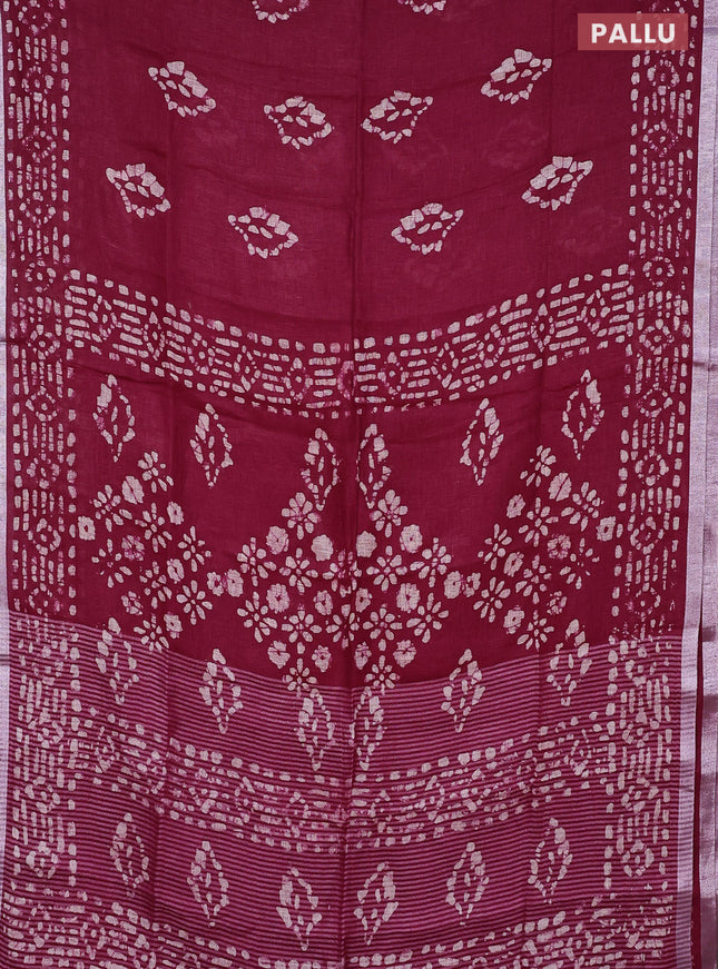 Pure linen saree maroon with allover batik prints and silver zari woven border
