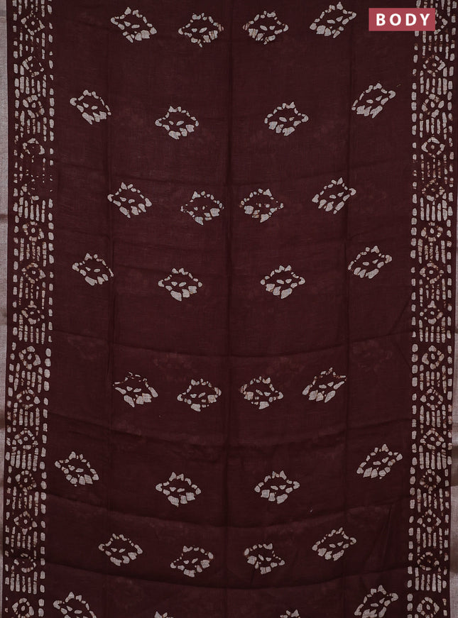 Pure linen saree brown with allover batik prints and silver zari woven border
