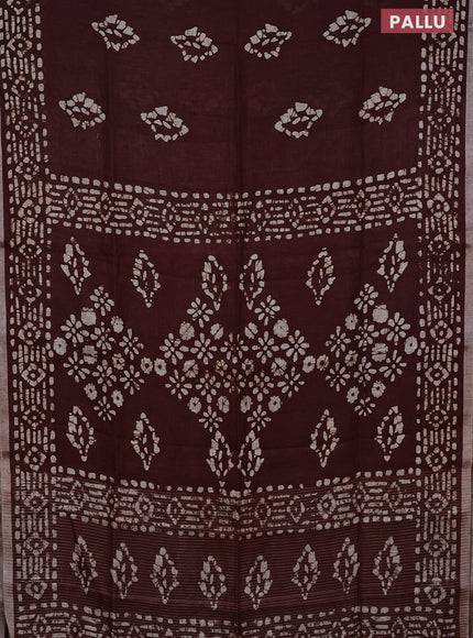 Pure linen saree brown with allover batik prints and silver zari woven border