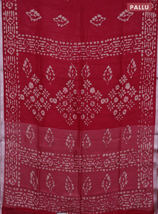 Pure linen saree dark pink with allover batik prints and silver zari woven border