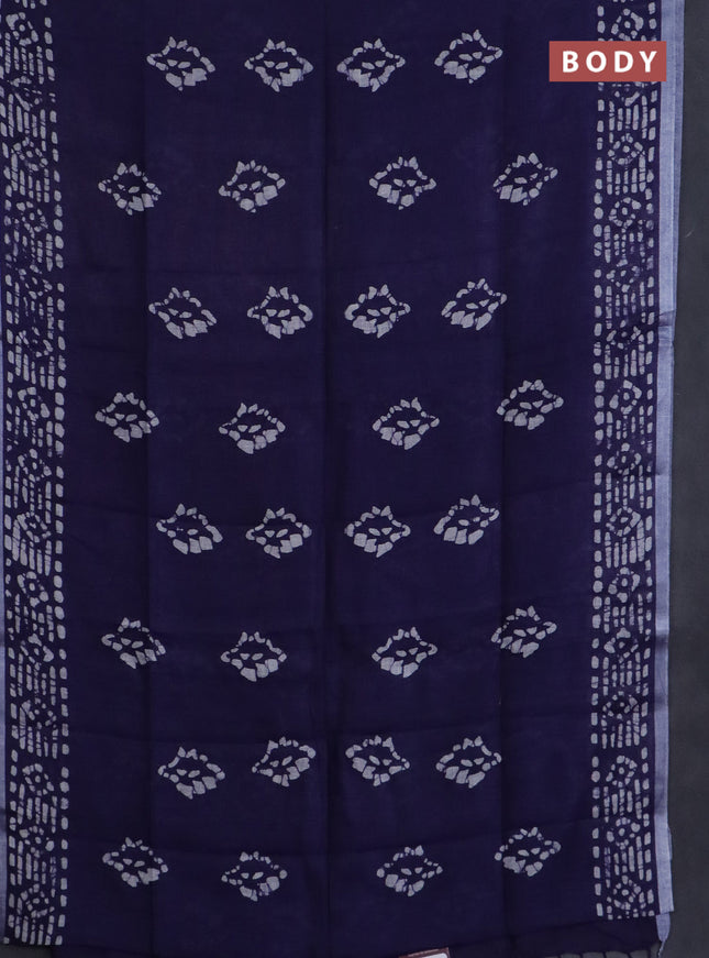 Pure linen saree navy blue with allover batik prints and silver zari woven border
