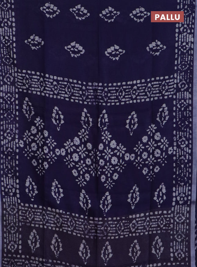 Pure linen saree navy blue with allover batik prints and silver zari woven border
