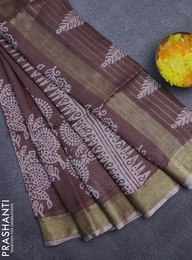 Pure linen saree pastel brown with allover prints and zari woven border