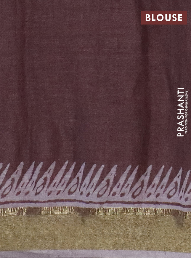Pure linen saree pastel brown with allover prints and zari woven border