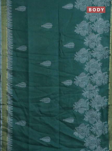 Pure linen saree teal green with allover prints and zari woven border