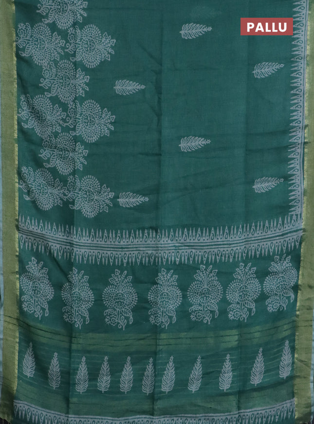 Pure linen saree teal green with allover prints and zari woven border