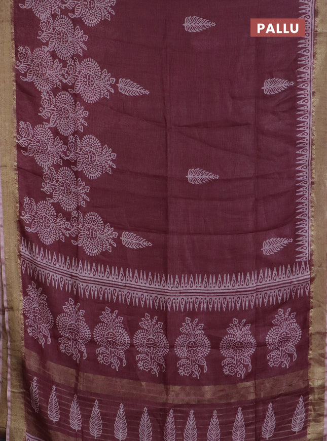 Pure linen saree pastel maroon with allover prints and zari woven border