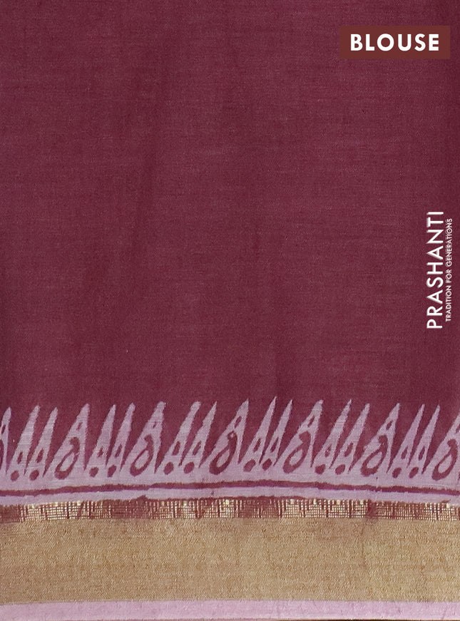 Pure linen saree pastel maroon with allover prints and zari woven border