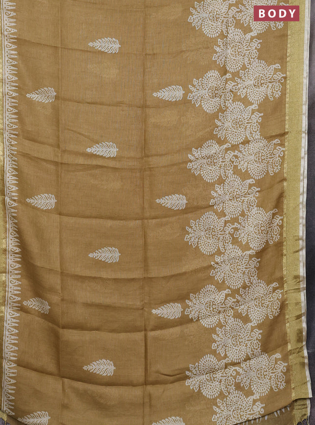 Pure linen saree sandal with allover prints and zari woven border