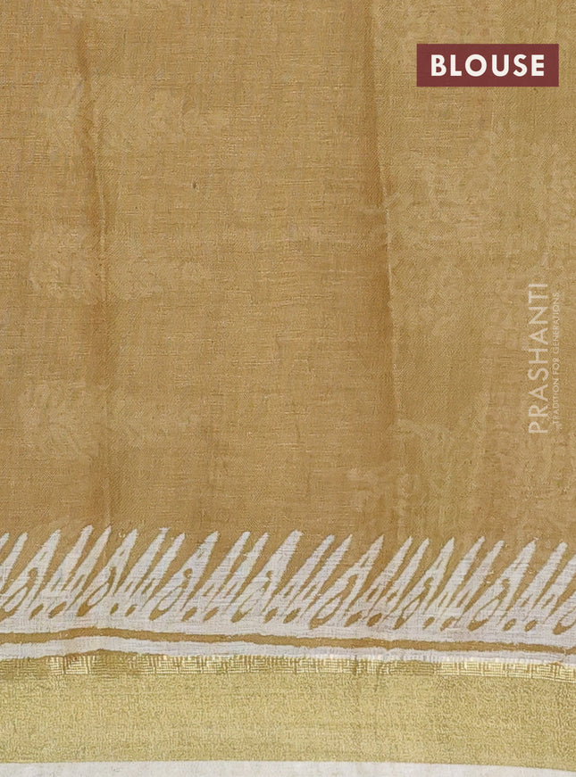 Pure linen saree sandal with allover prints and zari woven border