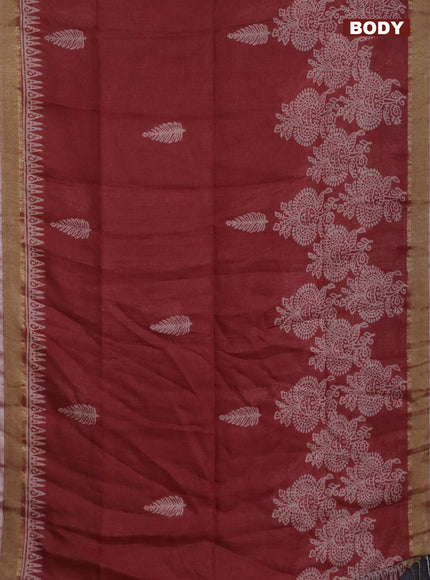 Pure linen saree pastel maroon with allover prints and zari woven border