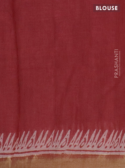 Pure linen saree pastel maroon with allover prints and zari woven border