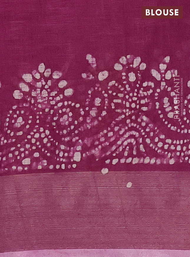 Pure linen saree wine shade with allover batik prints and zari woven border