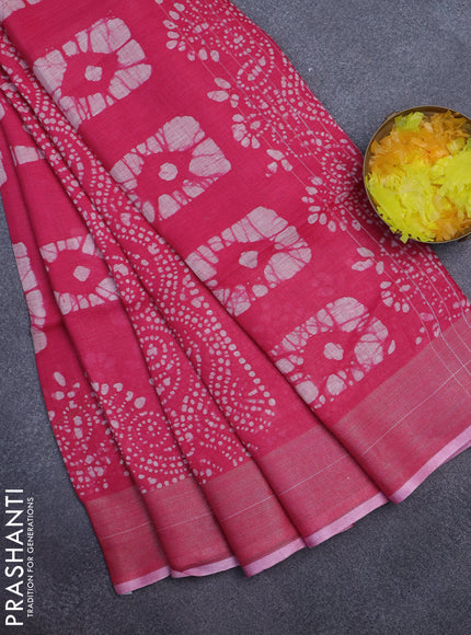 Pure linen saree pink with allover batik prints and zari woven border