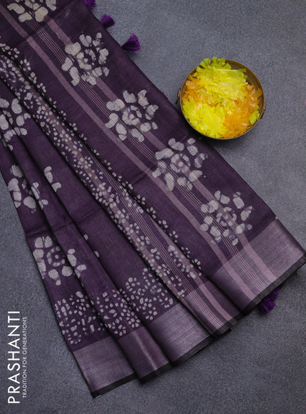 Pure linen saree deep violet and black with allover batik prints and silver zari woven border
