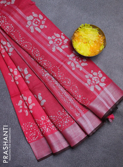Pure linen saree pink and black with allover batik prints and silver zari woven border