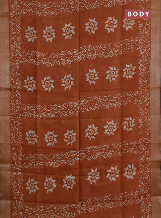 Pure linen saree dark mustard and black with allover batik prints and silver zari woven border