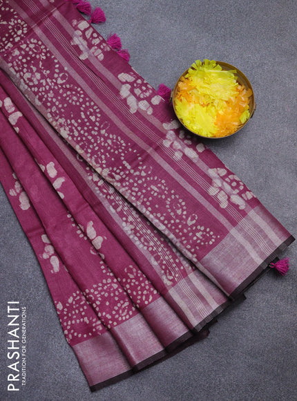 Pure linen saree wine shade and black with allover batik prints and silver zari woven border