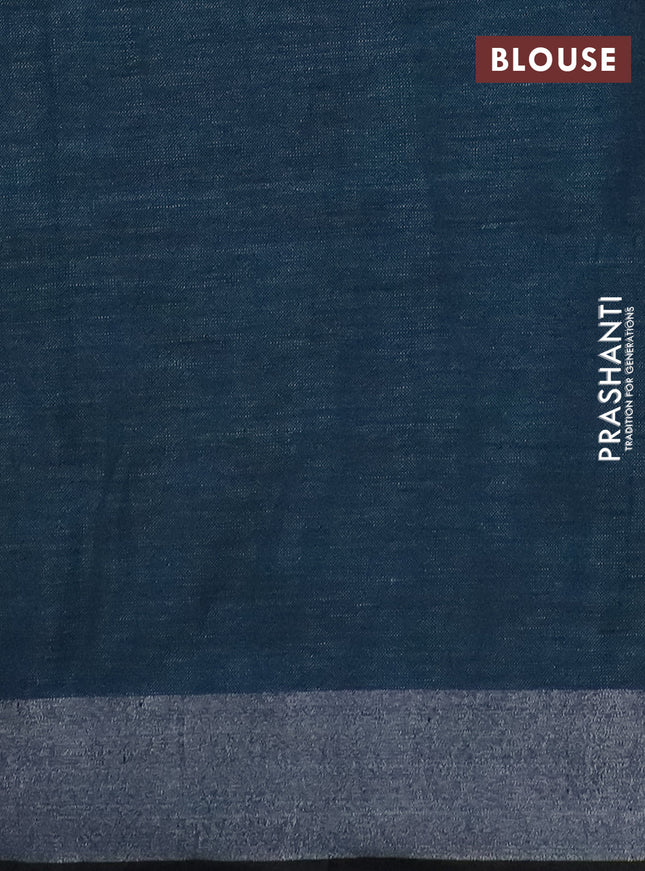Pure linen saree teal blue shade and black with allover batik prints and silver zari woven border