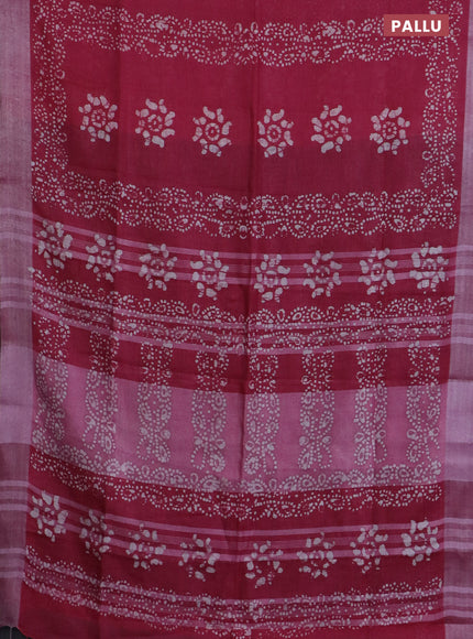 Pure linen saree pink and black with allover batik prints and silver zari woven border