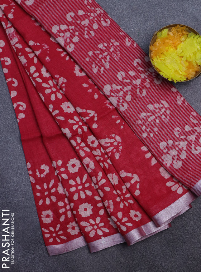 Pure linen saree dark pink with allover batik prints and silver zari woven border