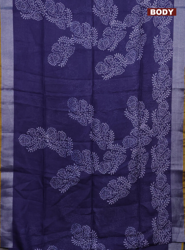 Pure linen saree blue shade with allover prints and silver zari woven border