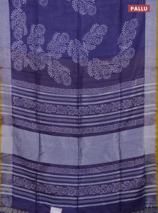 Pure linen saree blue shade with allover prints and silver zari woven border