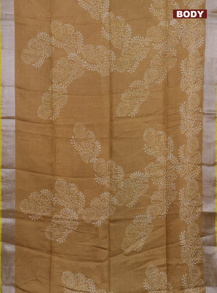 Pure linen saree dark sandal with allover prints and silver zari woven border