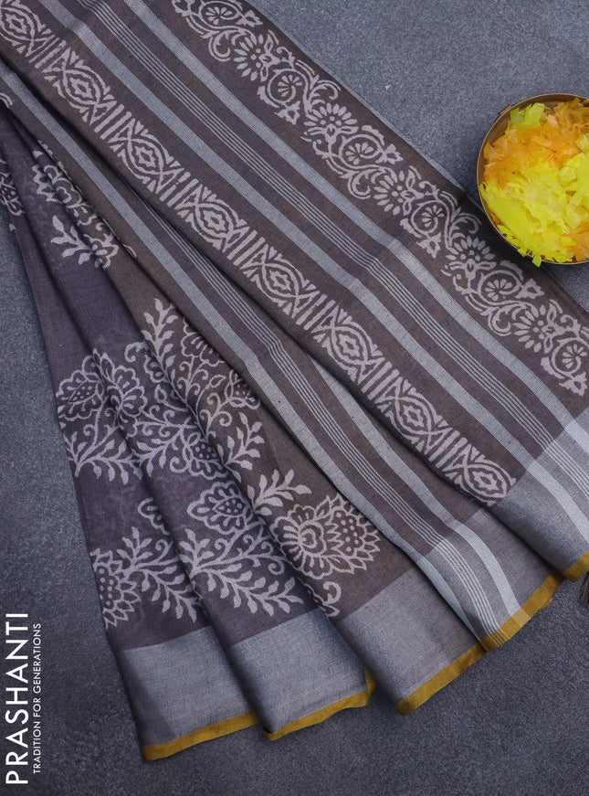 Pure linen saree grey shade and yellow with allover prints and silver zari woven border