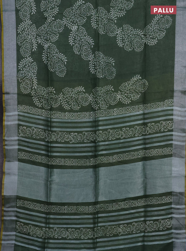 Pure linen saree green and yellow with allover prints and silver zari woven border