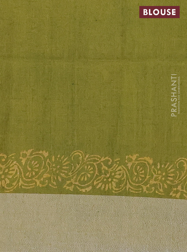 Pure linen saree green and yellow with allover prints and silver zari woven border