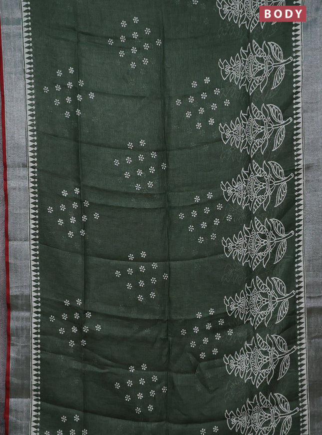 Pure linen saree sap green and red with batik butta prints and silver zari woven border