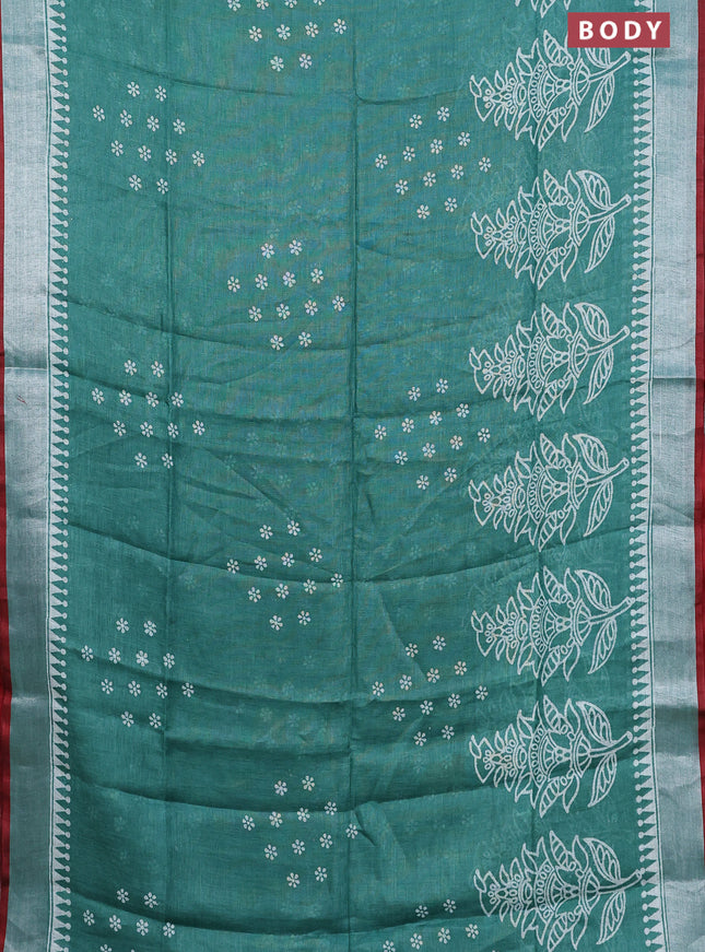 Pure linen saree teal green and red with batik butta prints and silver zari woven border