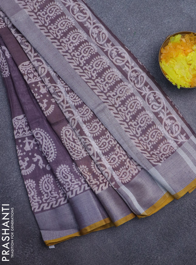 Pure linen saree pastel purple and mustard yellow with allover prints and silver zari woven border